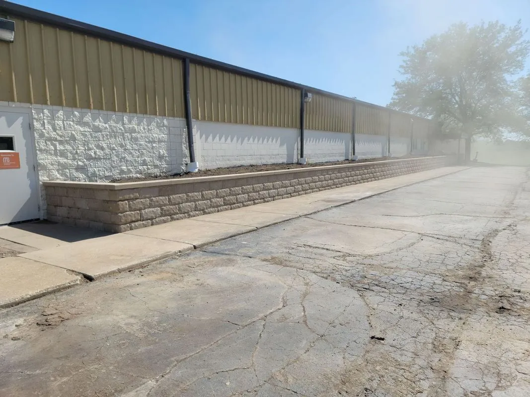 Hardscape installation project with pavers, patios and retaining walls by KBK Landscaping (photo 11)