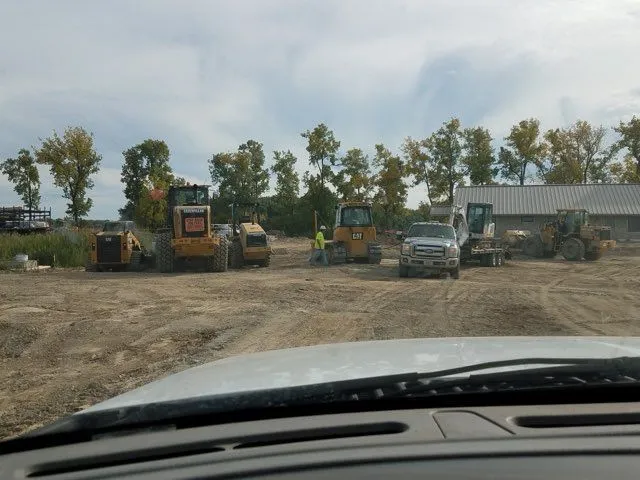 Commercial mowing equipment on a KBK Landscaping job site