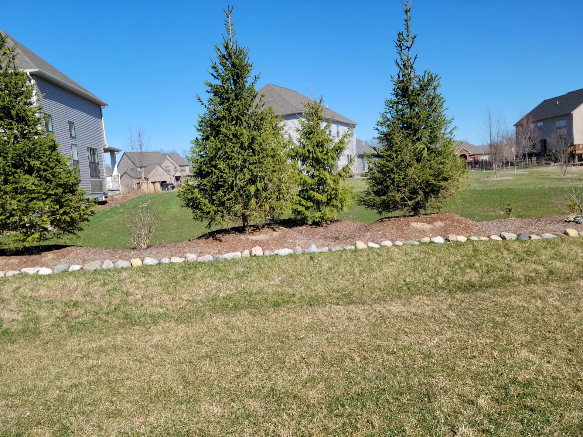 Well-kept commercial property lawn maintained by KBK Landscaping