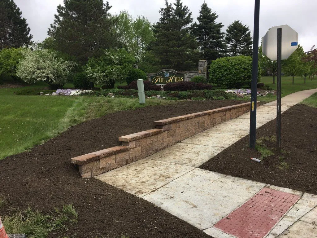 Hardscape installation project with pavers, patios and retaining walls by KBK Landscaping (photo 21)