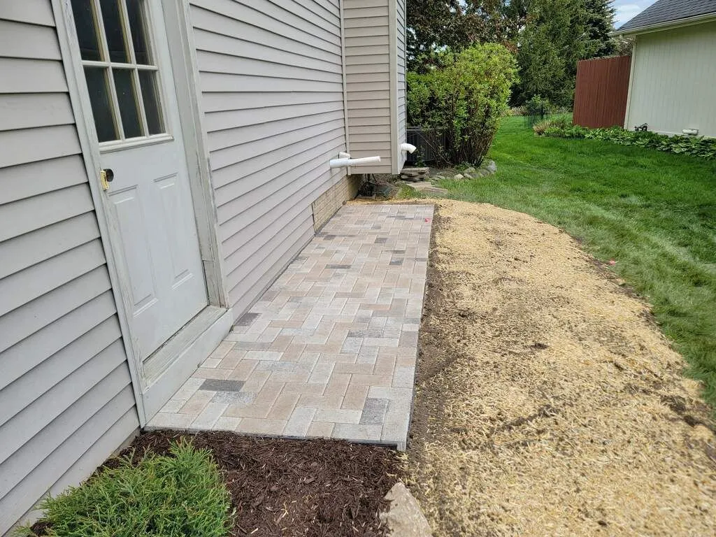 Hardscape installation project with pavers, patios and retaining walls by KBK Landscaping (photo 32)