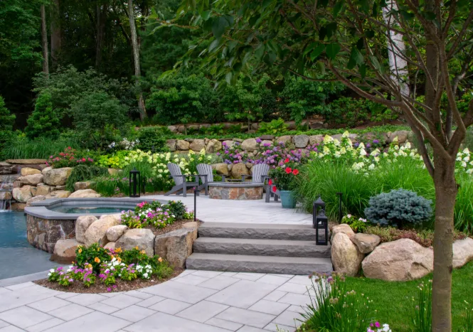Designed garden path bordered by mature plantings