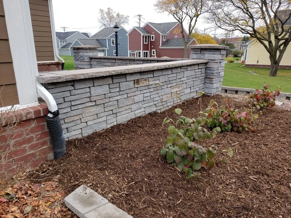 Hardscape installation project with pavers, patios and retaining walls by KBK Landscaping (photo 15)