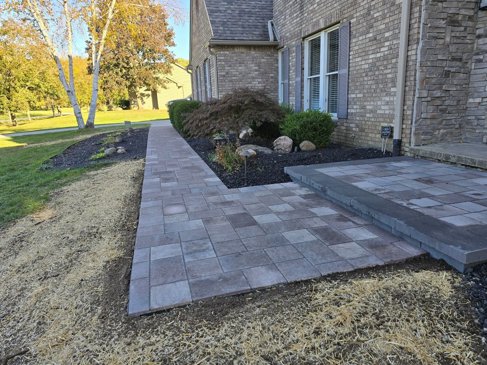 Custom paver patio and hardscape installed by KBK Landscaping