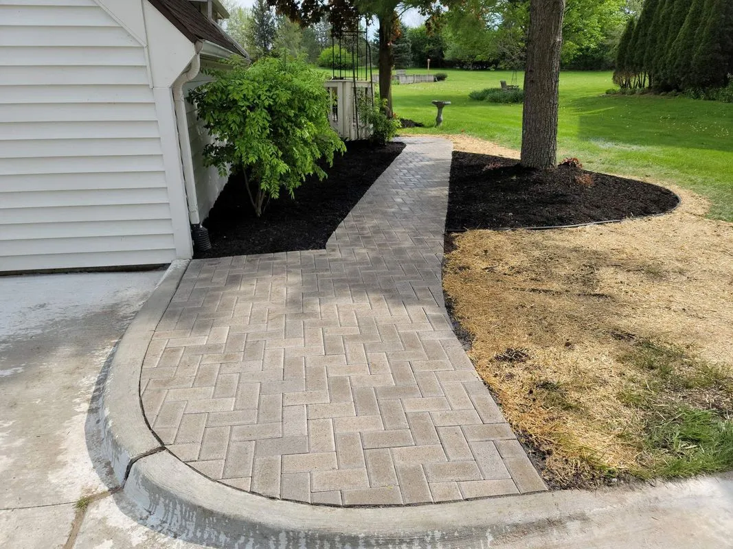 Hardscape installation project with pavers, patios and retaining walls by KBK Landscaping (photo 12)