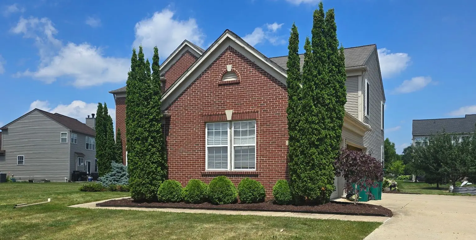 Freshly landscaped residential yard maintained by KBK Landscaping