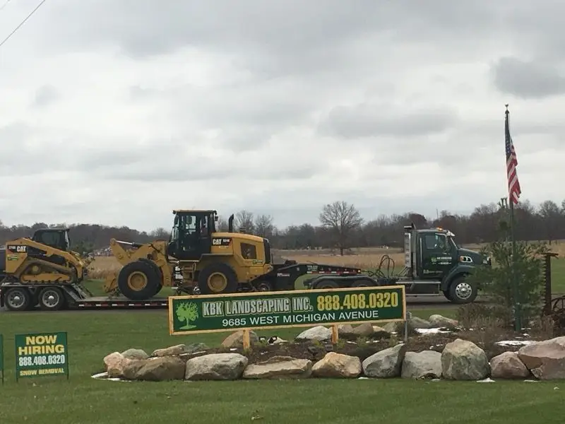KBK Landscaping commercial mowing across a large open field