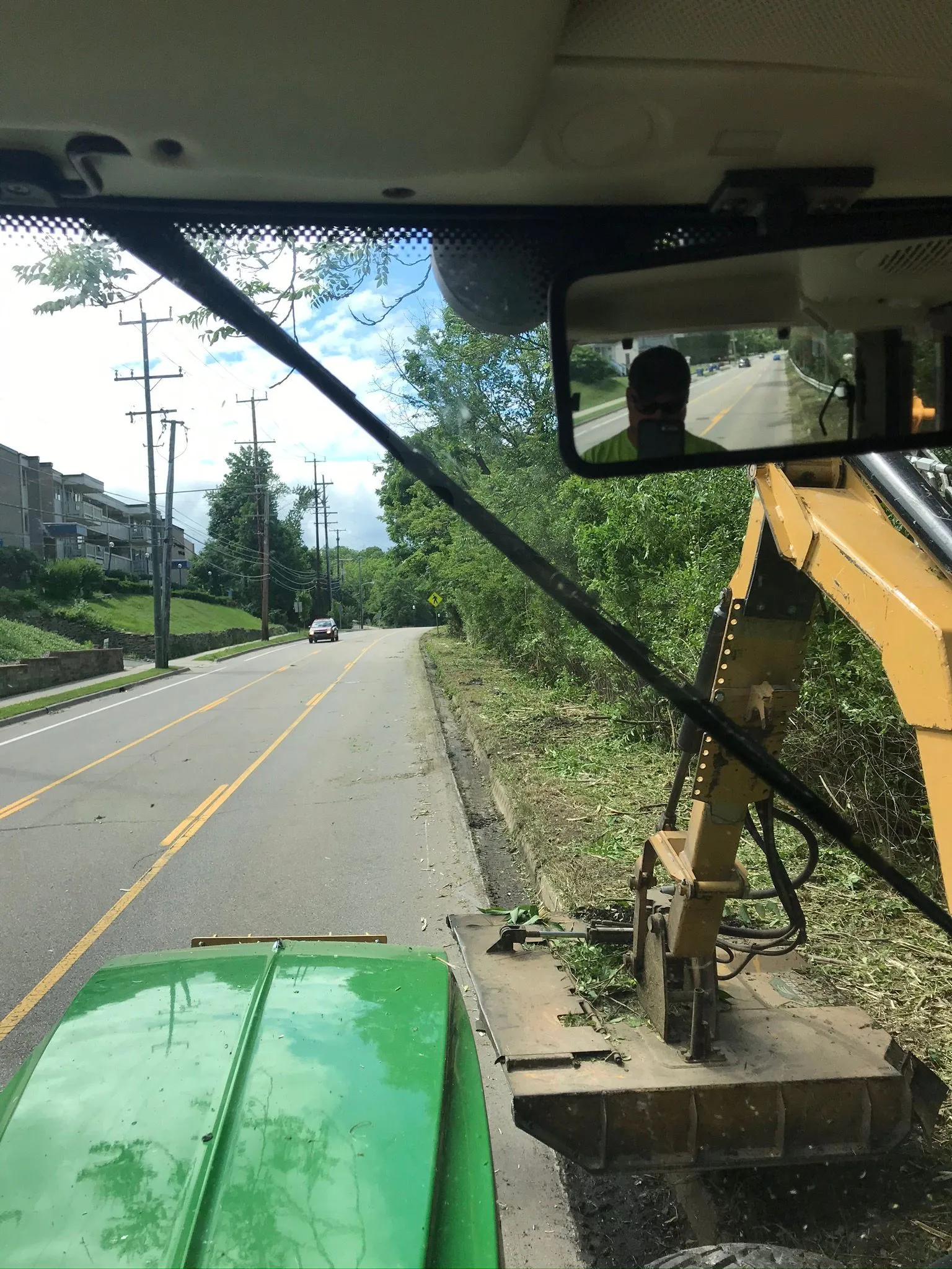 Cleared roadside corridor after professional brush and field mowing